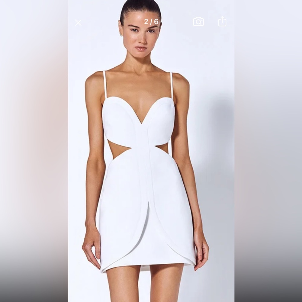 White sexy cut out dress! BRAND NEW. Perfect for a bachelorette